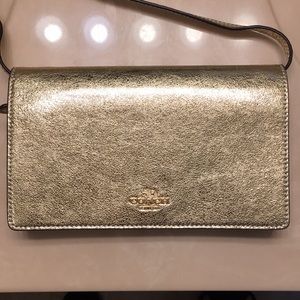 Gold coach crossbody bag